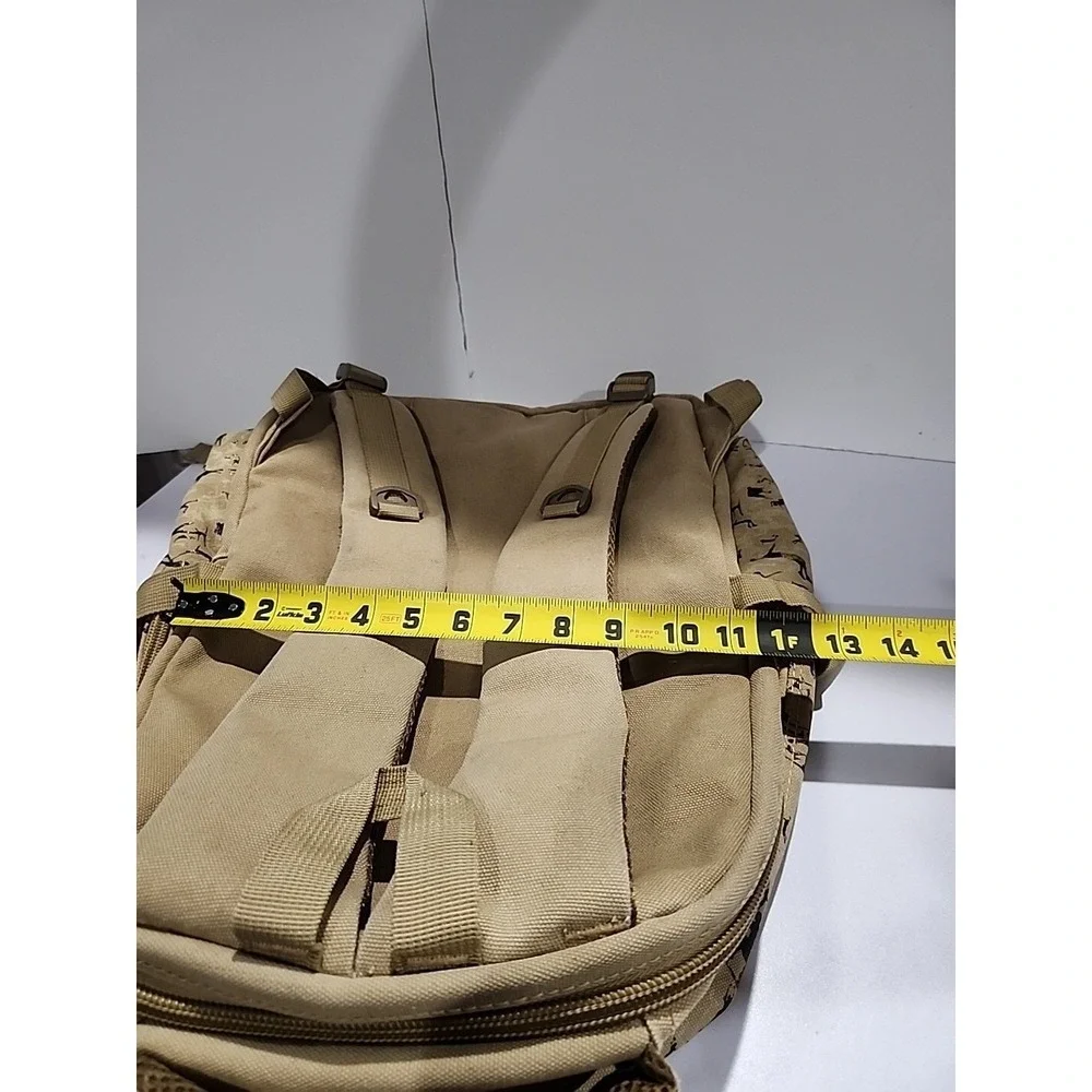 Tan Khaki Canvas Backpack Silhouette Print Multi Pocket Travel Bag